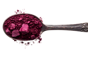 Superfood product. Beetroot powder in spoon isolated on white