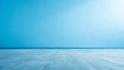 Empty room with light blue wall and concrete floor