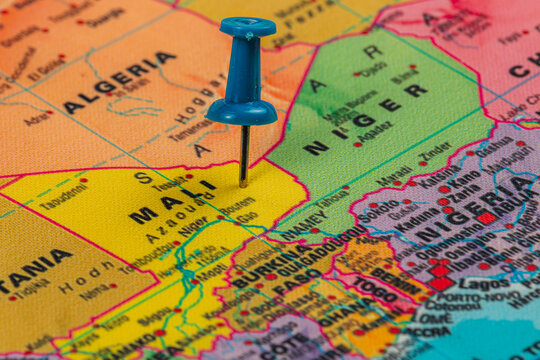Lviv Ukraine 05.14.25 Pinpointing Mali on a colorful map of West Africa