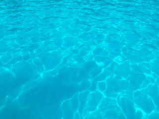 photo of beautiful blue water surface in swimming pool