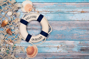 Nautical background with shells, rope and a lifebuoy