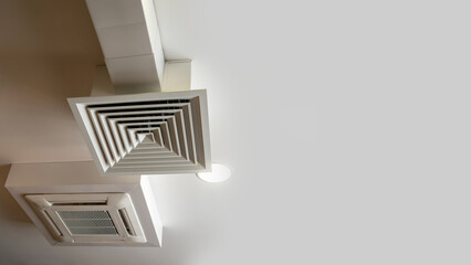 Vents system. Ventilation shafts under ceiling. Place for inflow of clean air into premises....
