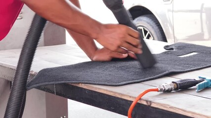 The professional car carpet cleaning process in action ensuring a spotless and fresh appearance
