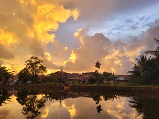 A beautiful golden-colored sunset in the city