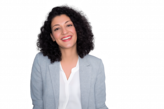 Professional portrait of a smiling woman with curly dark hair in a light gray blazer and white blouse on transparent background