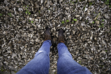 Man's feet with leaves