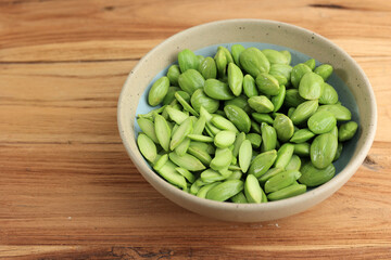 Petai Kupas Raw Green Stinky Bean on Ceramic Bowl