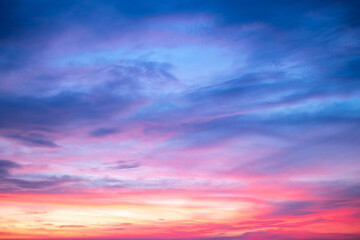 Sky,Beautiful sunset view, luxury soft gradient orange gold clouds and sunlight on the blue dramatic sky perfect for the background, morning, evening,Twilight, climate change,horizontal sunset photo