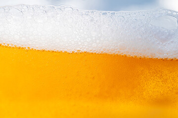 Close up bright orange Oil or beer splash texture and nature waves, Beautiful waves curve and little bubbles smooth for graphic design and background, Oil Bubbles, Soft beer bubbles, Selective focus