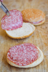 Making Salami Sandwiches