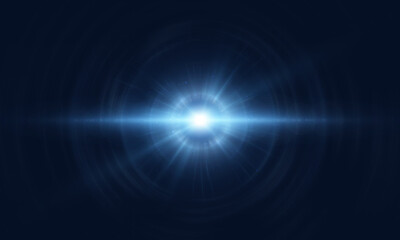 Obraz premium Bright radial explosion of light with blue glow and subtle lens flares on a dark background. Abstract lighting effect for sci-fi designs, space and game interfaces