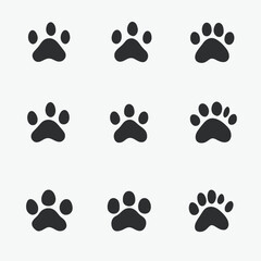 Fototapeta premium Paw prints animal pet dog cat puppy kitten footprint track cute vector illustration graphic design pattern 