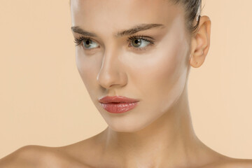 Professional makeup application showcasing foundation techniques in various texture and color tones.