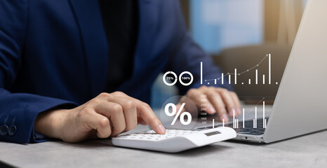 close up manager leader man hand using calculator to check company profit monthly with virtual report screen for predict business strategy concept