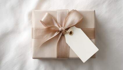 Elegant Gift Box with Gold Ribbon and Blank Tag on White Fabric, Representing Celebration and Thoughtful Giving for Special Occasions : Generative AI