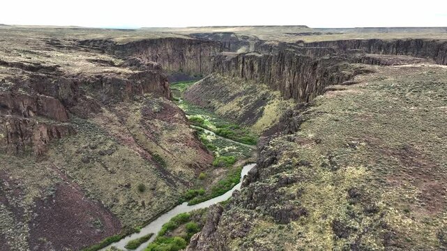 Rocky canyon walls and Owyhee River