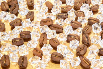 A captivating blend of roasted coffee beans and clear ice cubes on a radiant golden base,...