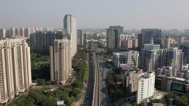Drone Shot of DLF Golf Course Road Gurgaon &ndash; Aerial View of Luxury High-Rises, Modern Infrastructure, Green Spaces, and Premium Real Estate in Gurugram, India