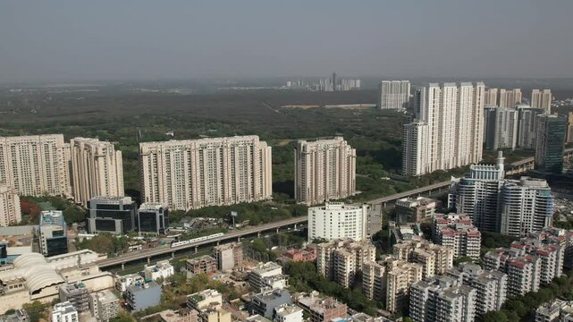 Drone Shot of DLF Golf Course Road Gurgaon &ndash; Aerial View of Luxury High-Rises, Modern Infrastructure, Green Spaces, and Premium Real Estate in Gurugram, India