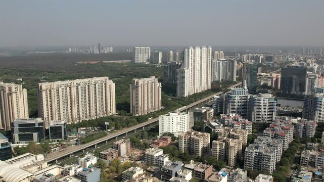 Drone Shot of DLF Golf Course Road Gurgaon &ndash; Aerial View of Luxury High-Rises, Modern Infrastructure, Green Spaces, and Premium Real Estate in Gurugram, India