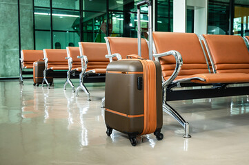 Abandon passenger baggage putting at waiting room in empty airport terminal