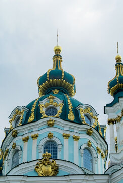 Kyiv, Ukraine Saint Andrew Church. Beautiful church with domes and golden cross on the roof, blue walls and gold domes. Orthodox Christian traditional church and cathedral with golden domes