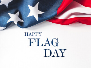 Happy Flag Day. American Flag and congratulatory inscription. No people. Closeup, top view. National holiday concept. Congratulations for family, relatives, friends and colleagues