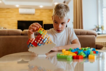 A sister and brother enjoy a fun moment playing board games at home, celebrating family bonding and love. The cozy scene captures the joy of sibling relationships and shared activities