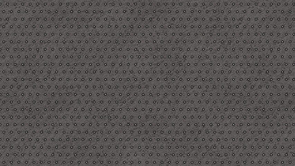 Gray surface with evenly spaced small circles forming a pattern grid