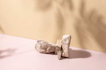 A refined stone podium set against a beige backdrop, enhanced with soft natural shadows—perfect...