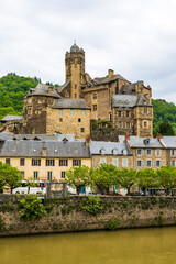 Castle of Estaing on a cloudy day from the banks of the Lot