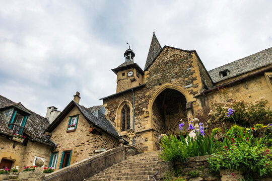 Church of Saint-Fleuret in the village of Estaing from the parvis (Fran&ccedil;ois Annat Square)