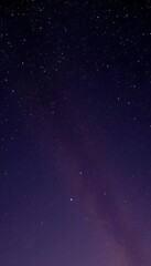 Fototapeta premium Majestic Night Sky with Countless Stars and a Deep Violet Gradient Background.