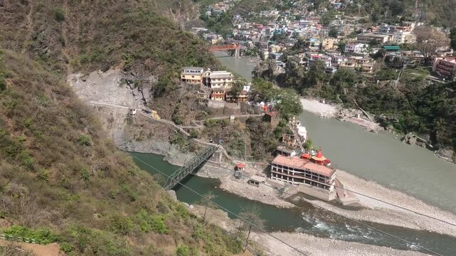 Drone View of Rudraprayag Sangam &ndash; Aerial Shot of the Sacred Confluence of Alaknanda and Mandakini Rivers Amidst Himalayan Landscape in Uttarakhand, India