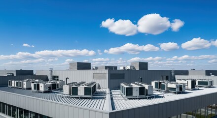 Outdoor compressor unit of industrial air conditioner on the rooftop of a commercial building. HVAC system and ventilation technology.