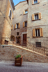 Historic architecture in medieval Urbino showcases charming details of Italy's Marche region