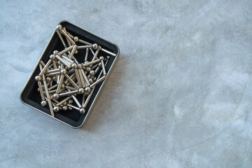 Fototapeta premium The neocube magnetic construction kit is in a box on the table.Magnetic balls to play with.