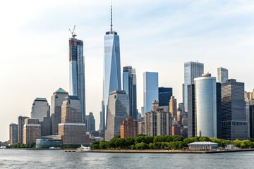 Fototapeta premium Modern Cityscape with Skyscrapers and Waterfront View at Daylight