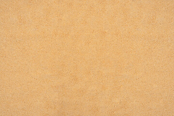 Smooth and Soft Yellow Sand Texture for Background or Design Purposes in High Quality