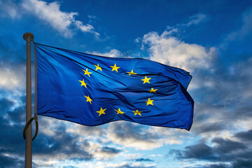 European Union flag. Blue banner with yellow stars	