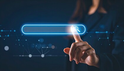 Fototapeta premium Woman's hand touching interactive search bar with glowing elements, depicting technology and digital exploration concept