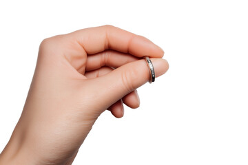 hand delicately holding thin silver band isolated on white background