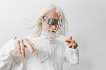 Futuristic character with white hair and stylish sunglasses against a white background, embodying a...