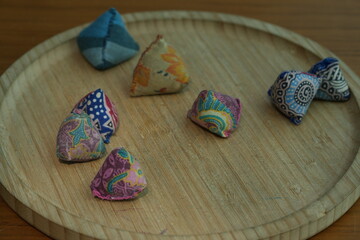 A handcrafted wooden spinning top that blends timeless design with playful charm. It offers a...
