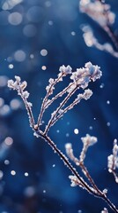 Soft snowflakes fall on a deep blue canvas, evoking a wintry ambiance. Vertical.