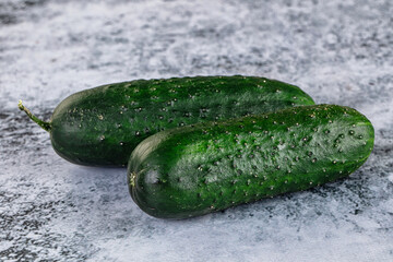 Ripe green raw two cucumbers