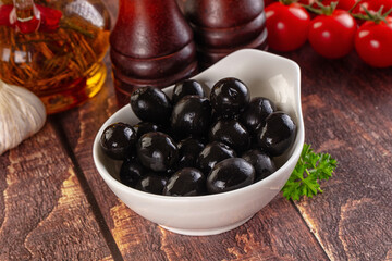 Mediterranean marinated Black olives in the bowl