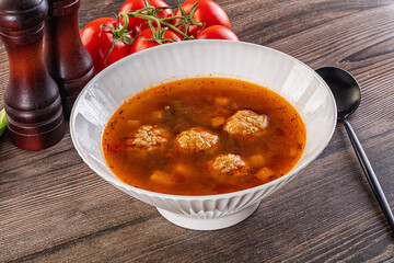 Tomato Soup with meatballs and vegetables