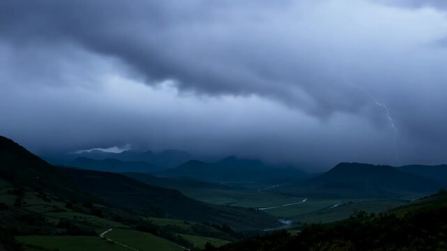 Stormy landscape with lightning over rolling hills