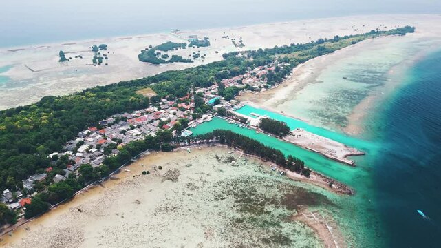 Aerial shot of Thousand Island, Indonesia Island of Pularu Pari